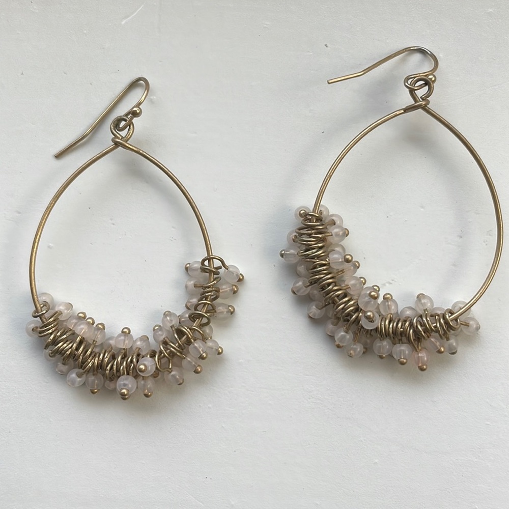 Light pink beaded earrings. Dangle earrings. Gold toned